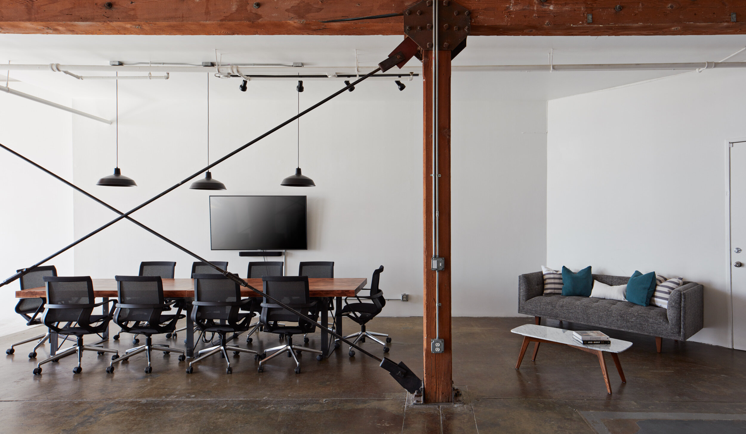 Large client area with conference table and sitting area. Los Angeles photography studio.