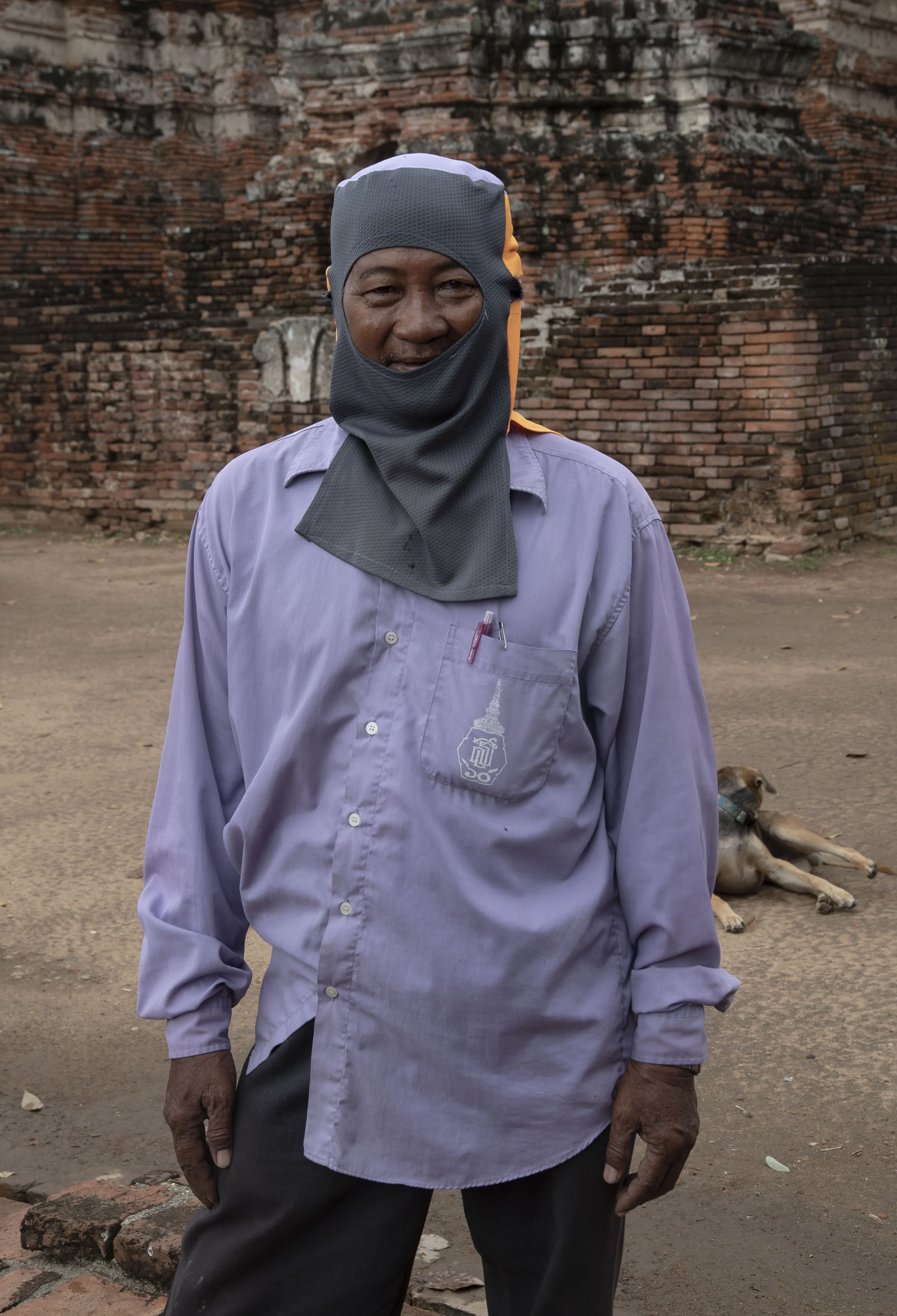 A sweeper man who let me take his picture. He was the most beautiful thing I saw that day.