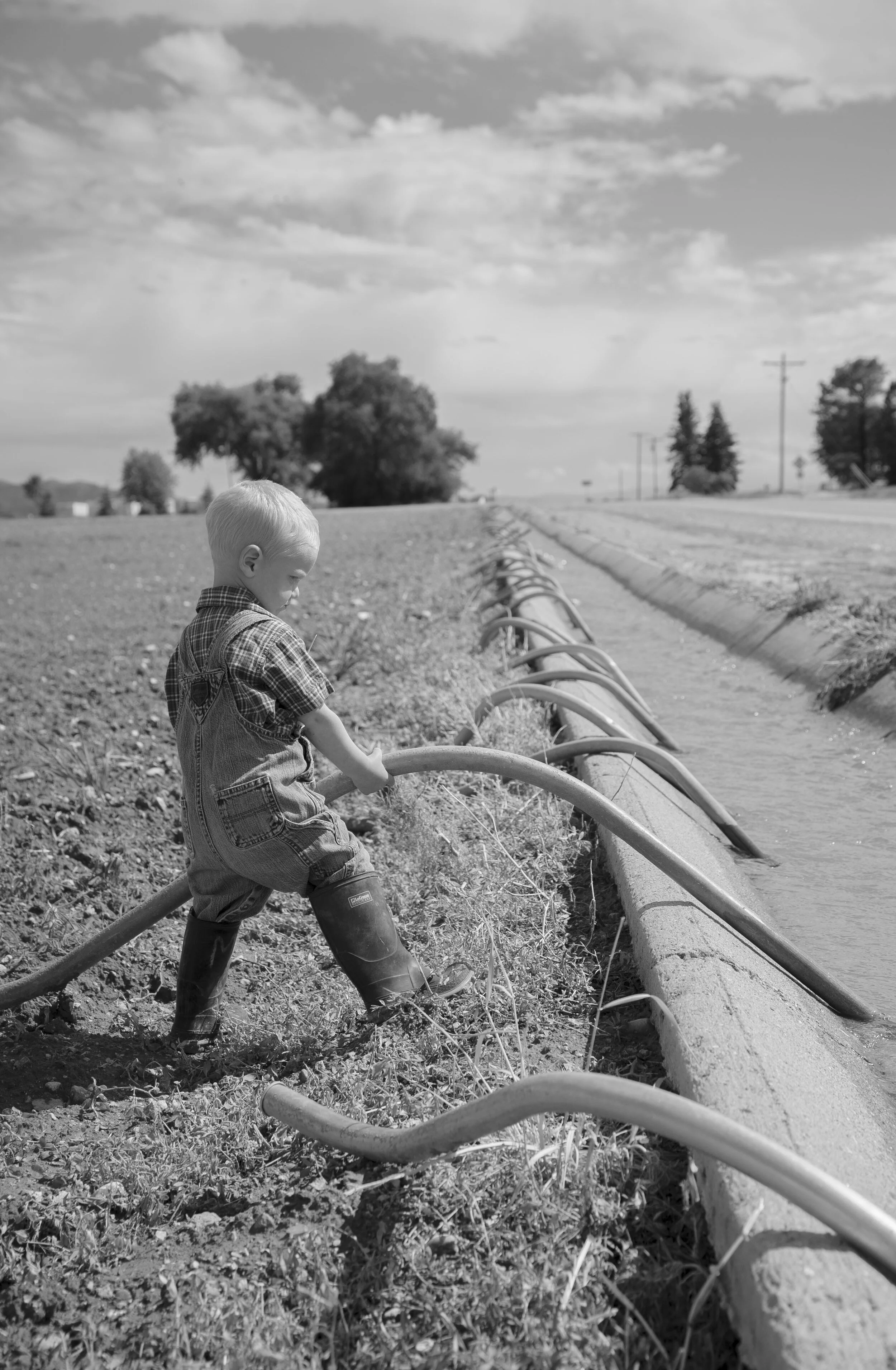 Farm Boys - Jude Fixing Ditch BW.JPG