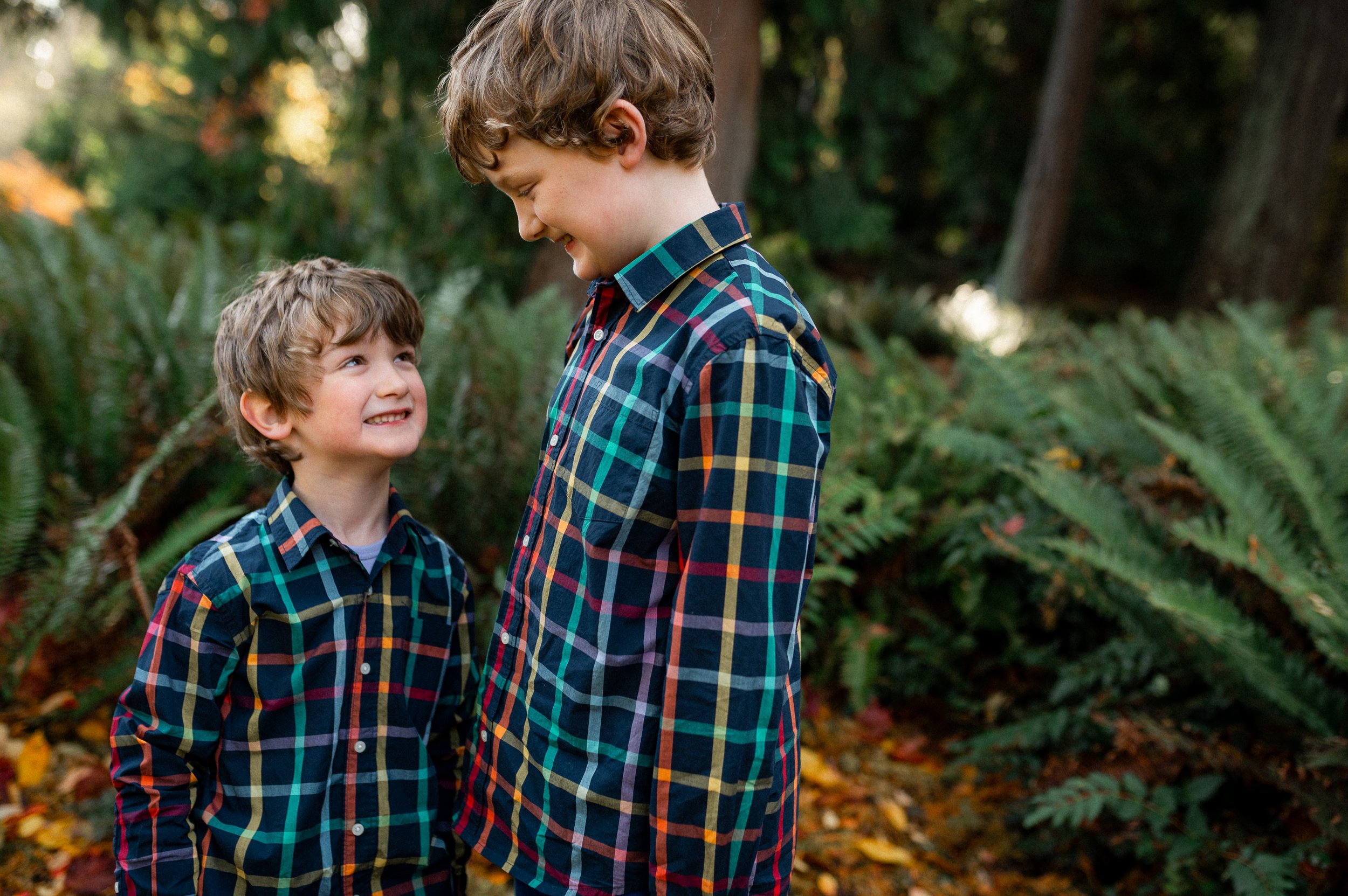 Seattle family in coordinated fall outfits during an autumn photo session