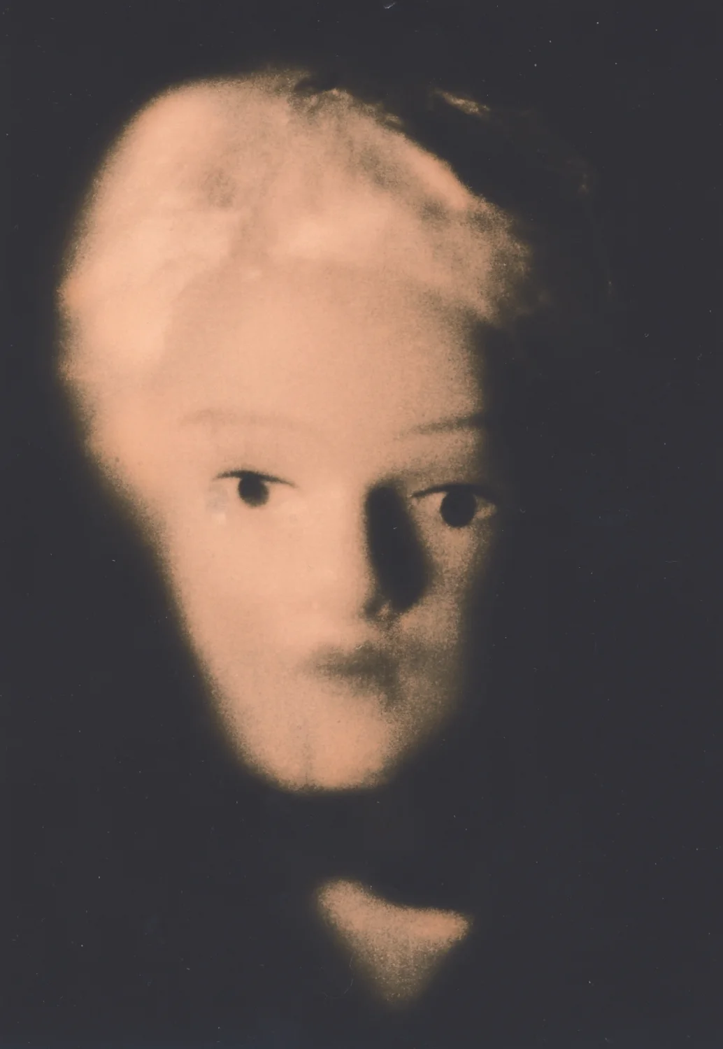 a face in the shadows