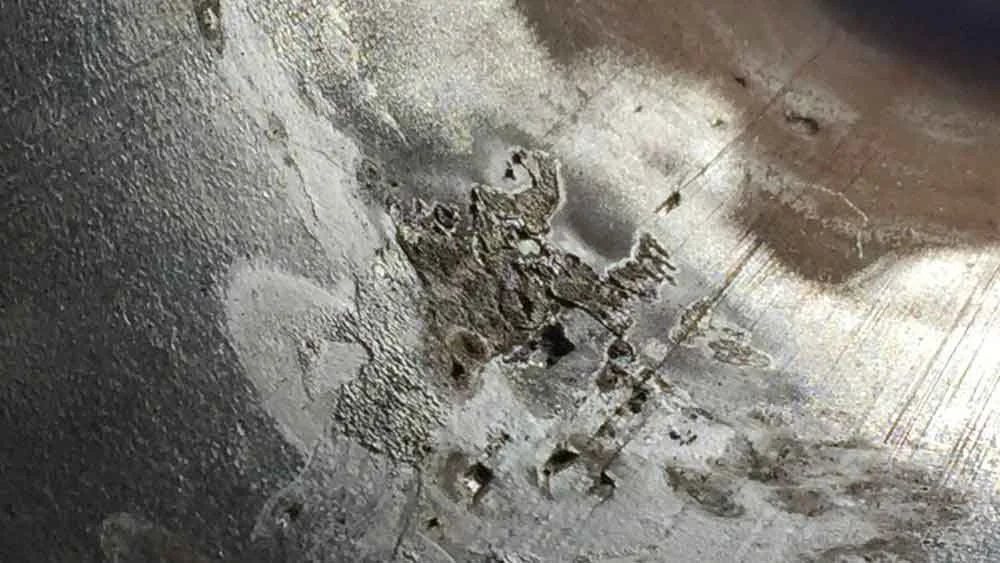Corrosion on a pipe wall