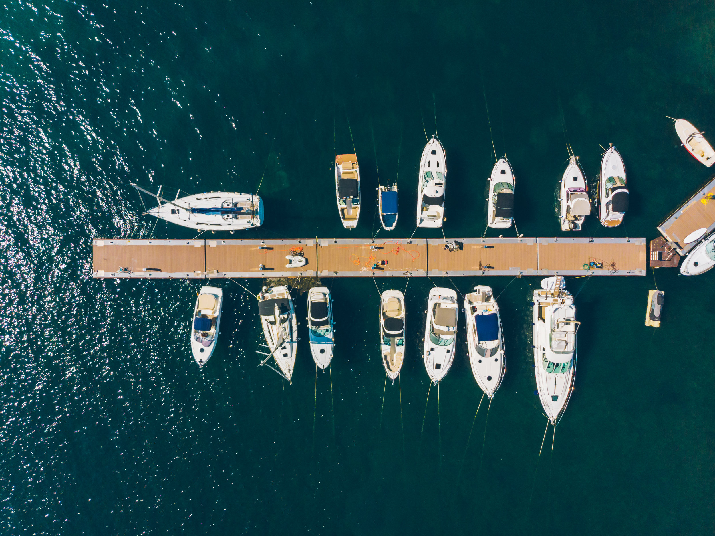 Aerial view looking down onto boats on a dock