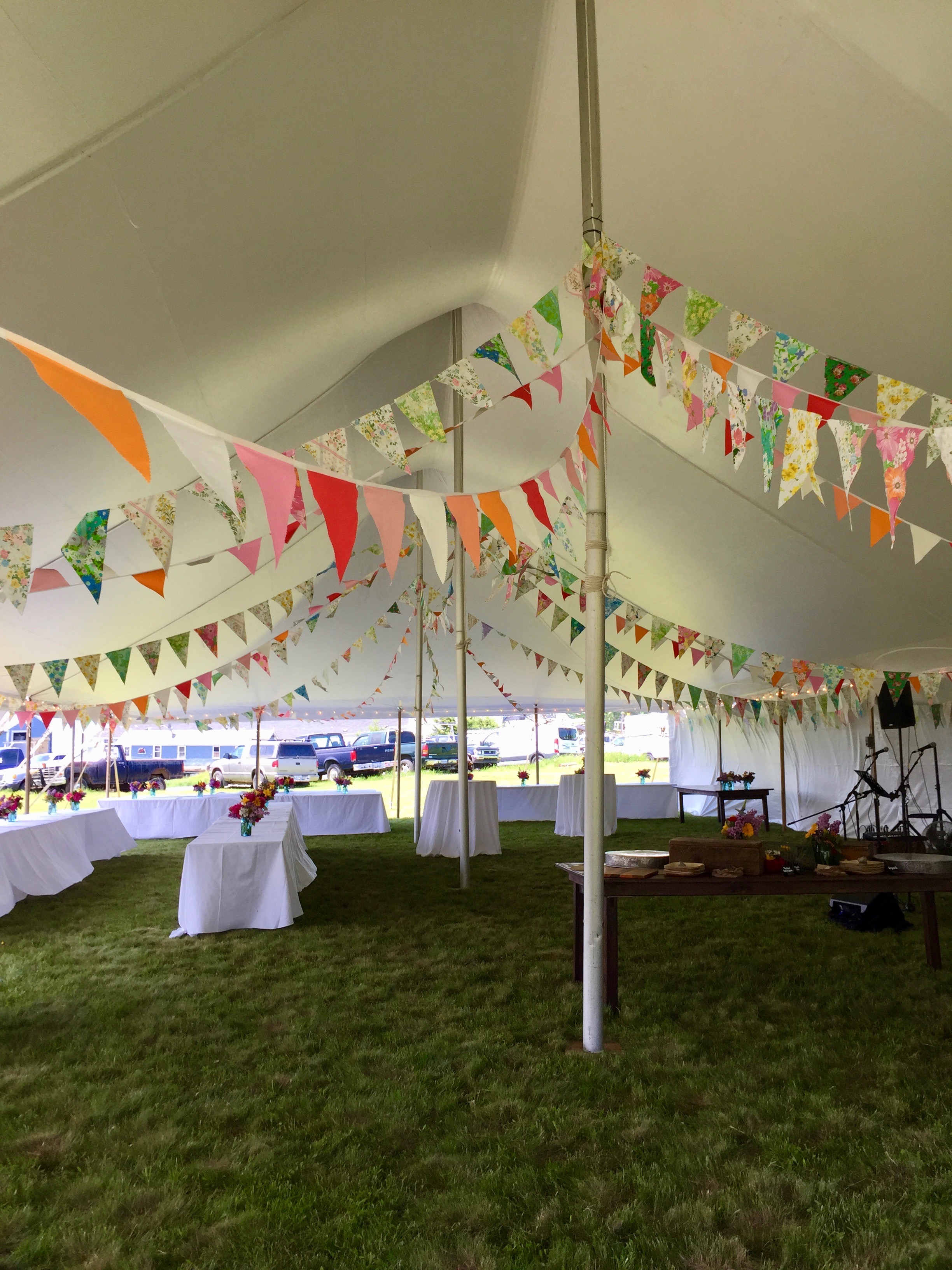 Handmade Flag banners (and aprons!) sewed by the bride, Emily’s, super talented seamstress mother.