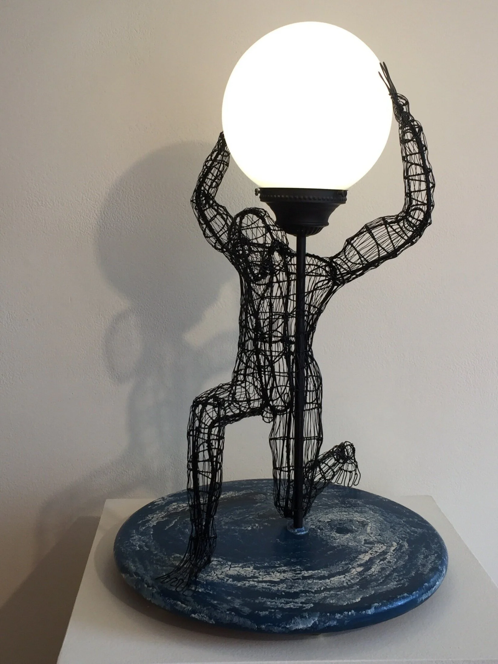 Atlas and the Moon, wire with working light