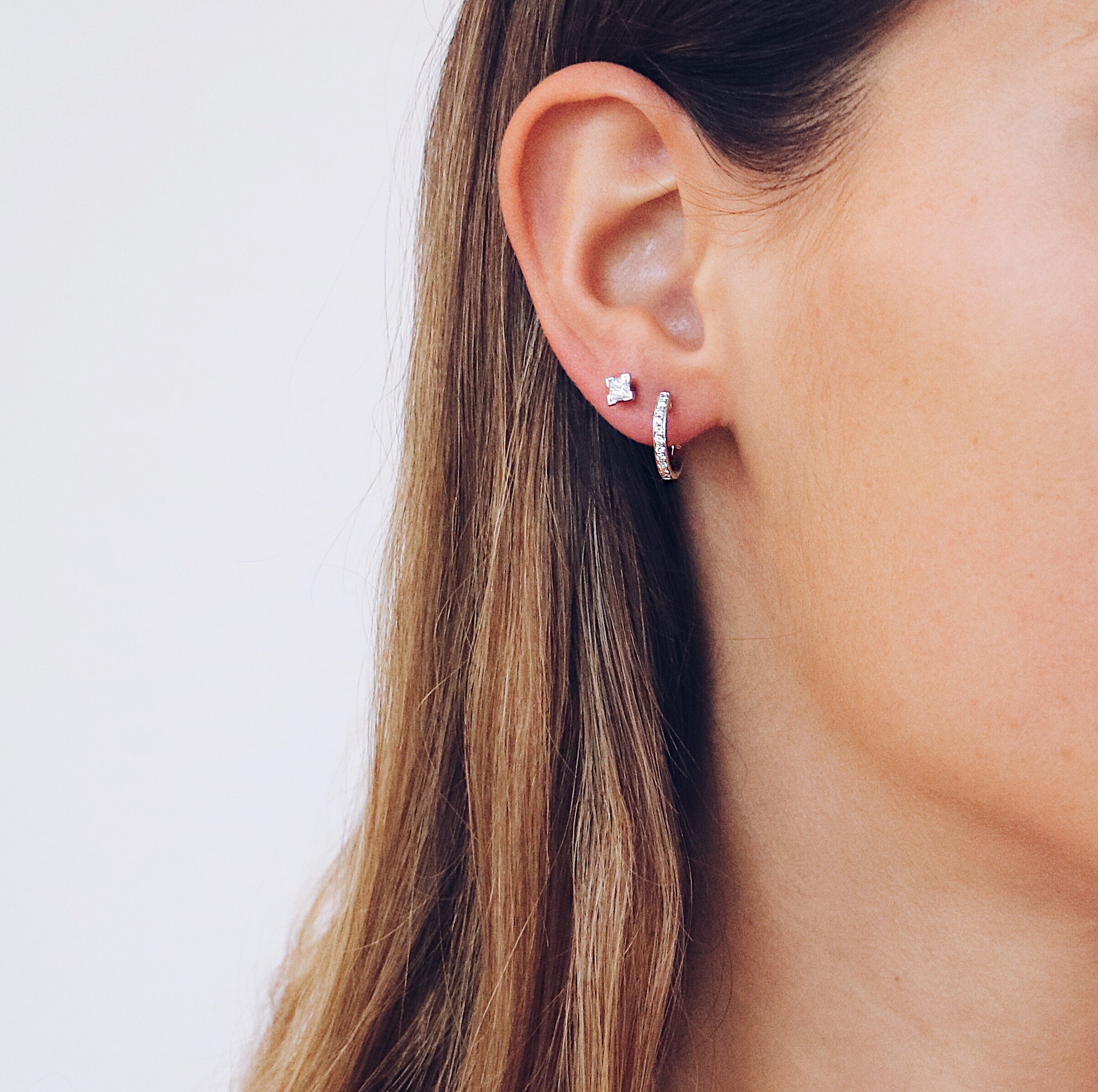 Diamond ear stud and diamond huggie earring