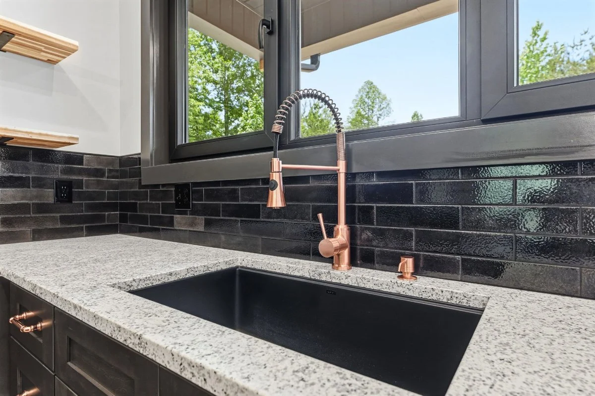 Kitchen sink window with efficient sliding design