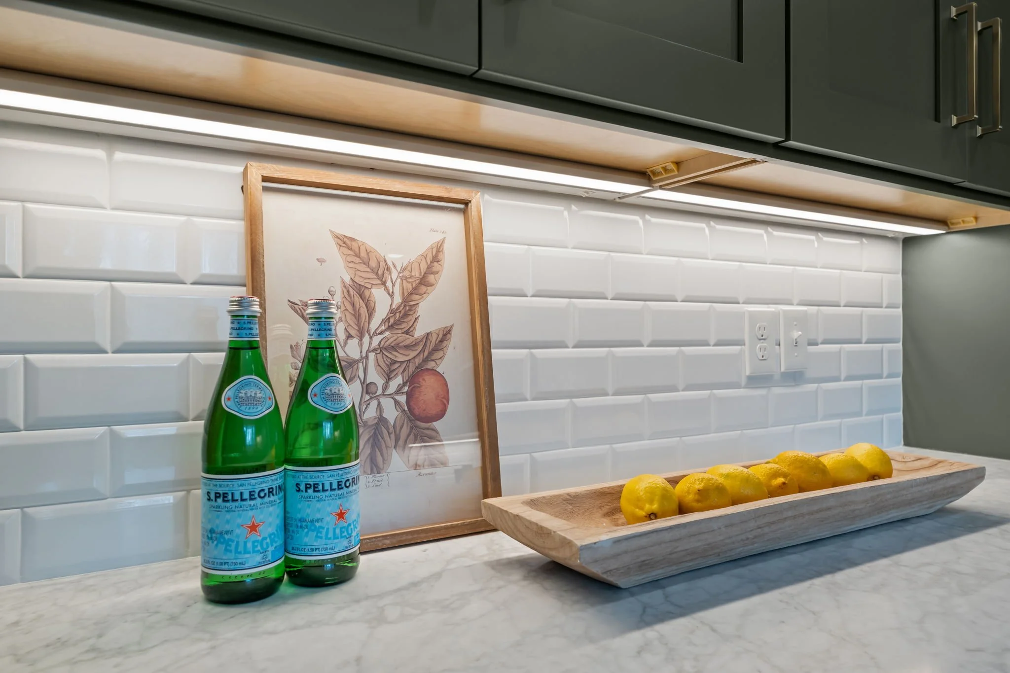 Kitchen Remodel Featuring Subway Tile Backsplash And Decorations.jpg