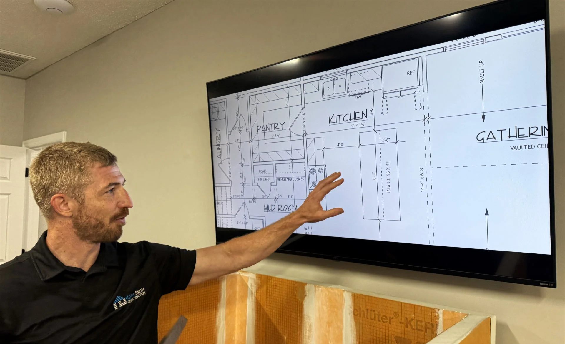 Holden reviewing plans for kitchen and pantry