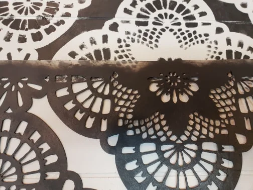 You can see where the paint and stencil line up at the edge