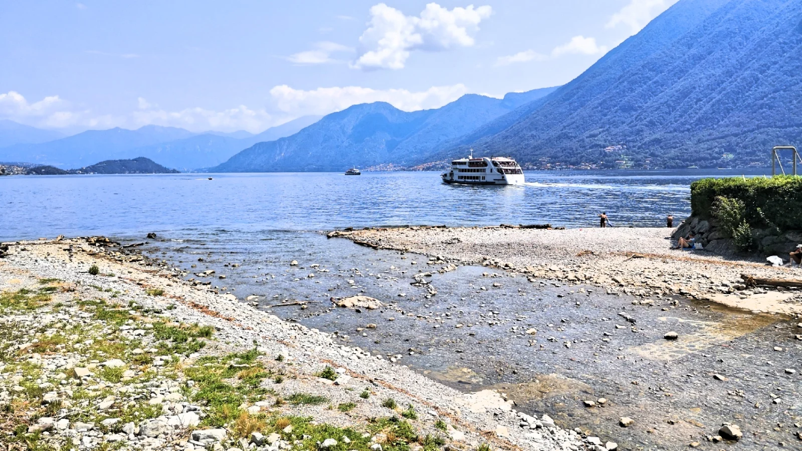 Public pebbled beach in Argegno, at the mouth of Telo river