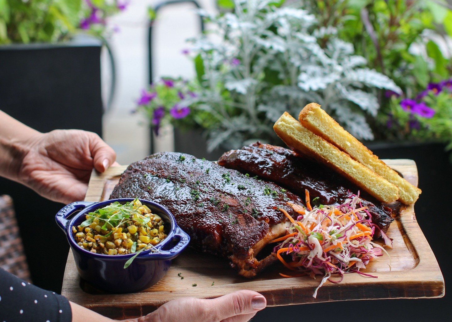 Memorial Day Weekend calls for BBQ on the patio 🍖 Today and tomorrow join us for specials alongside our regular menu⁠
⁠
Hickory Smoked BBQ | &frac12; slab baby back ribs, beef brisket, BBQ sauce, rainbow slaw, sweet corn, texas toast, honey whipped 