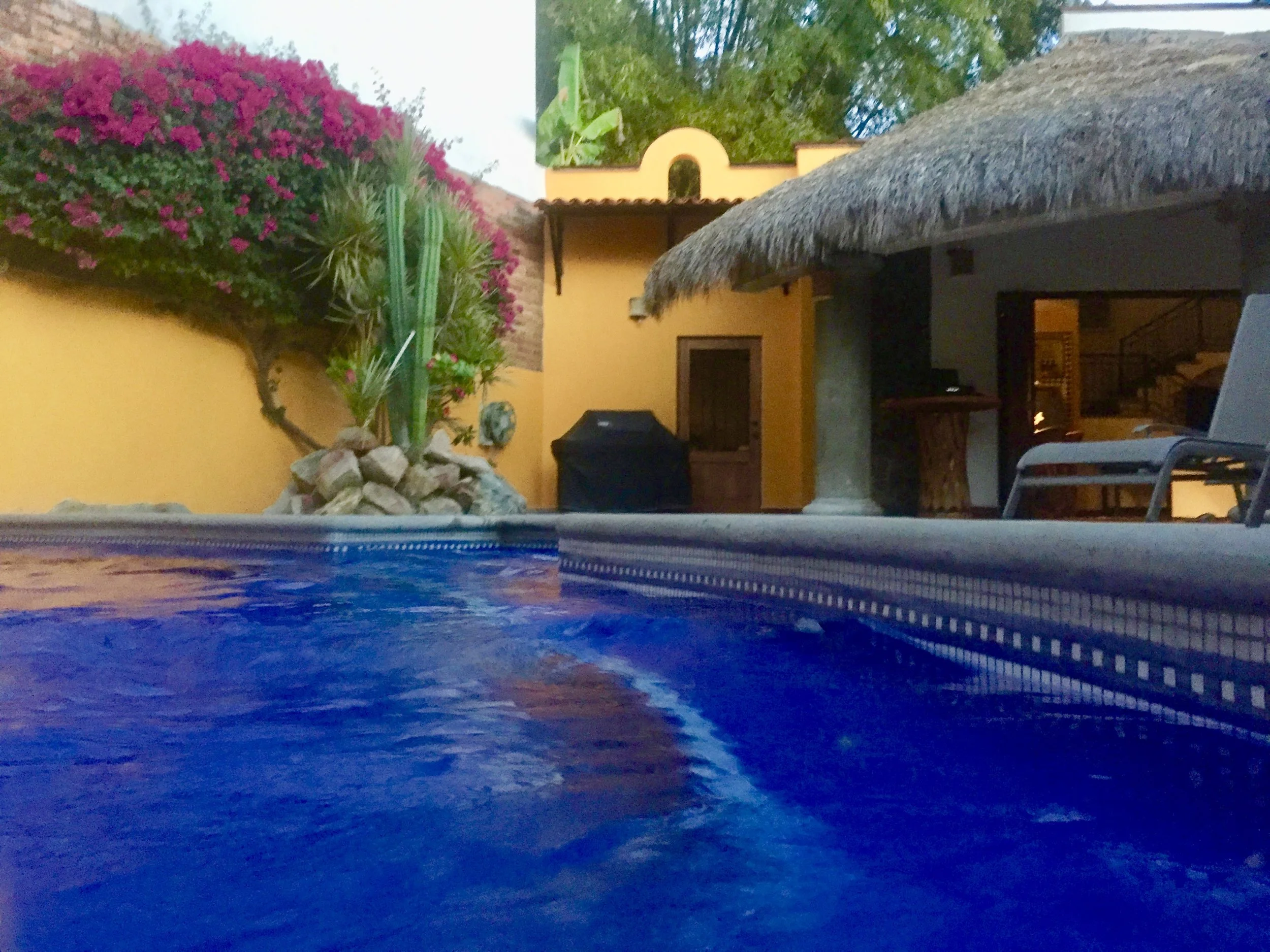 tHE POOL, OUTDOOR KITCHEN & DINING AREA