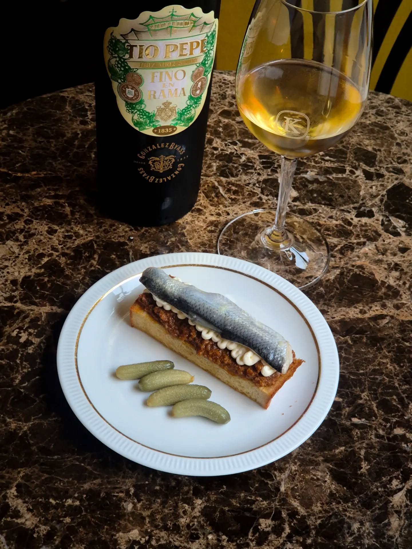 This week still we have the special Baltic Herring dish to join the @stadinsilakkamarkkinat 🐟 

A deconstructed Vorschmack on a toast with marinated Baltic Herring 🤤 Some dry Sherry in the glass to compliment the dish! 

P.S. Our dear @laurastyyra 