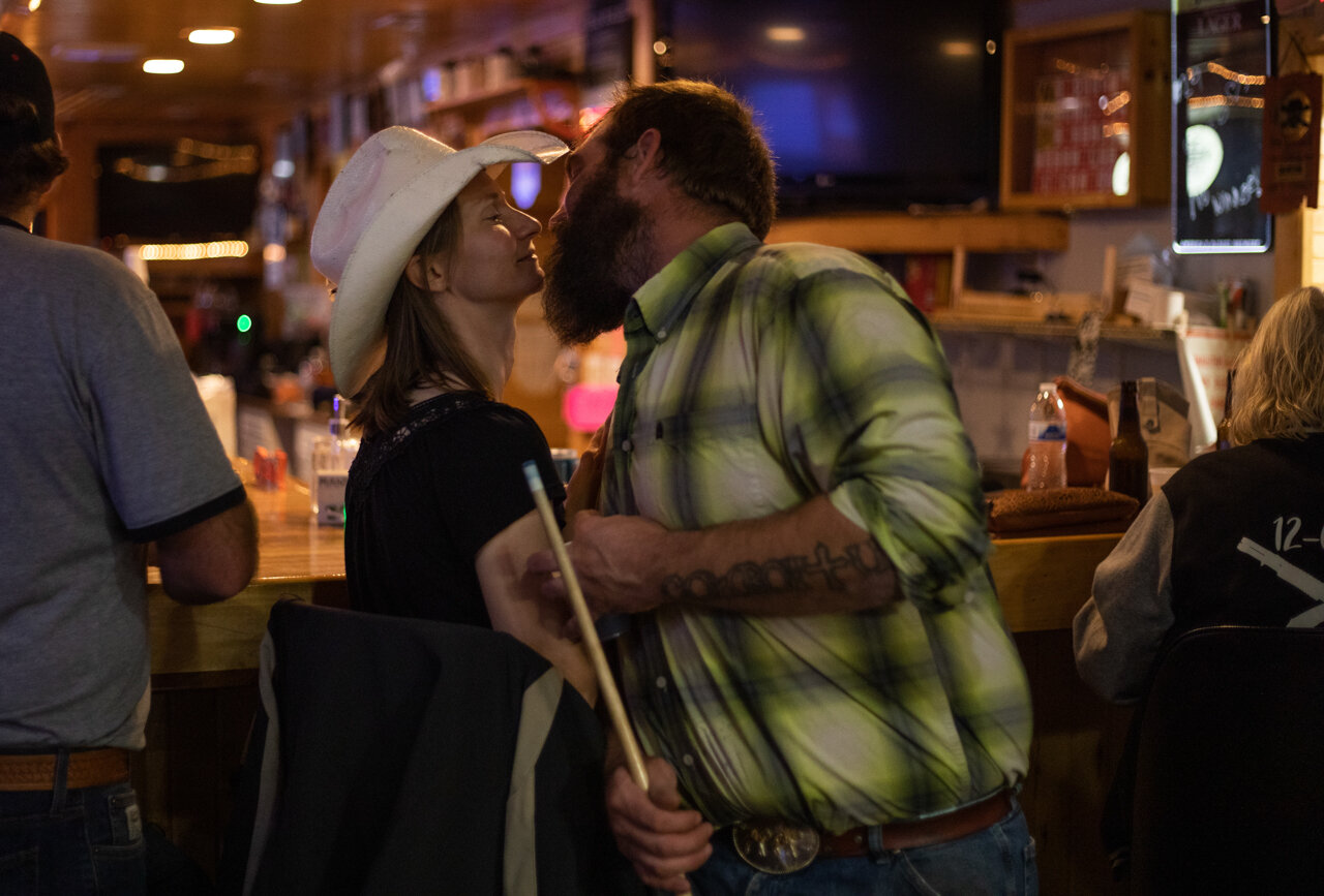  Charlie Musselman and his girlfriend Kristen Wiedmann drink and play pool at the American Legion 420 Hall in Murray City, Ohio, on Wednesday, Oct. 22, 2020. Musselman met Wiedmann when he started working on the ranch in July. They've been dating for