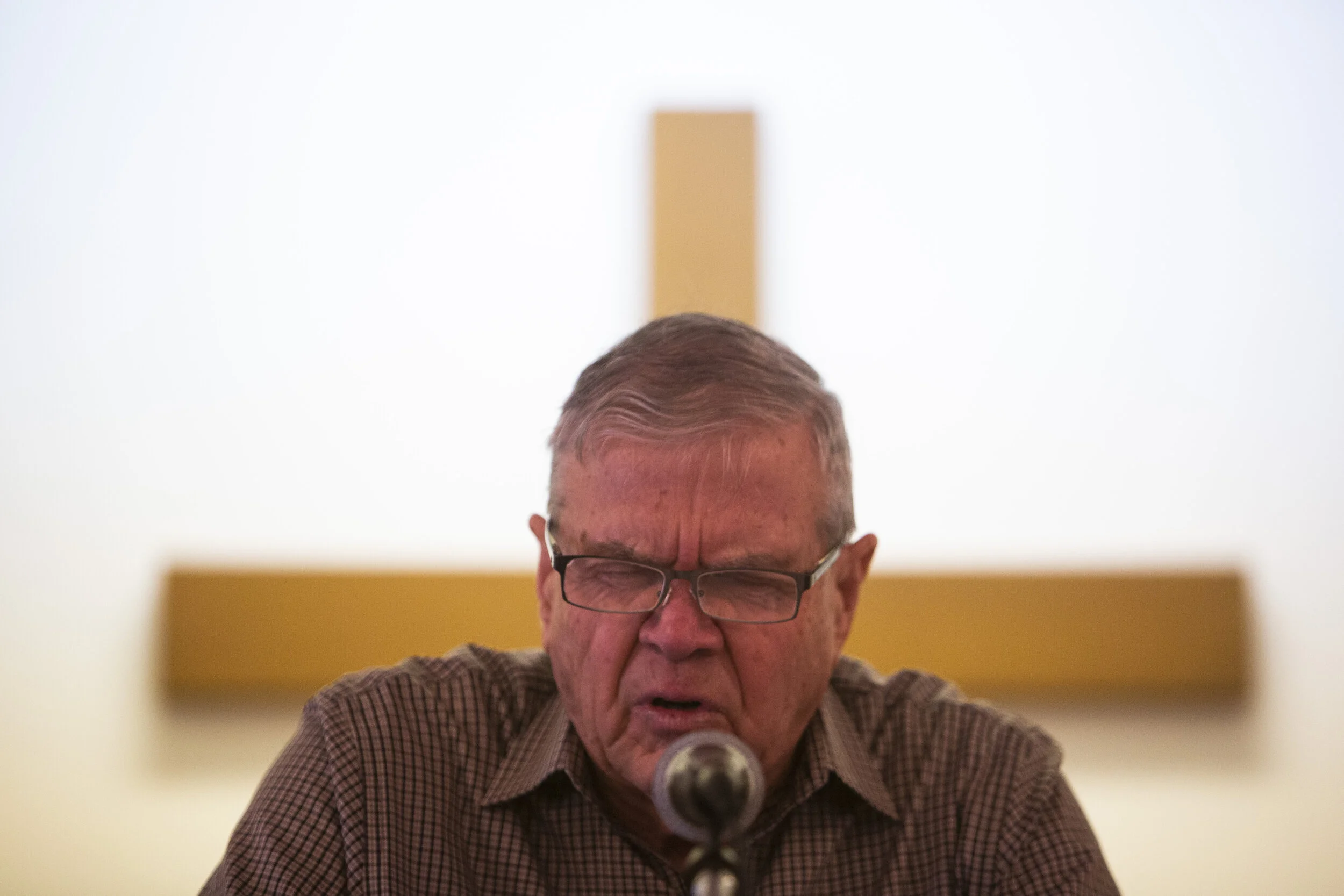  Buford Brown, 79, prays during a sermon in New Marshfield on Sunday, January 31, 2021. Brown holds the services with his wife of 57 years Ginny Brown, 75. Brown now primarily gives service to a middle-aged and elderly crowd of weekly parishioners. H