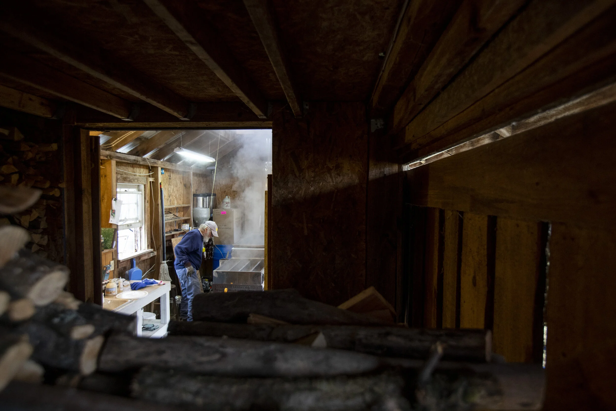  Pete Woyar prepares homemade maple syrup in a shack on his farm outside New Marshfield on Wednesday, February 24, 2021. Woyar said he has around 230 taps on trees throughout his property and has been making syrup since he was 12 years old. He has li
