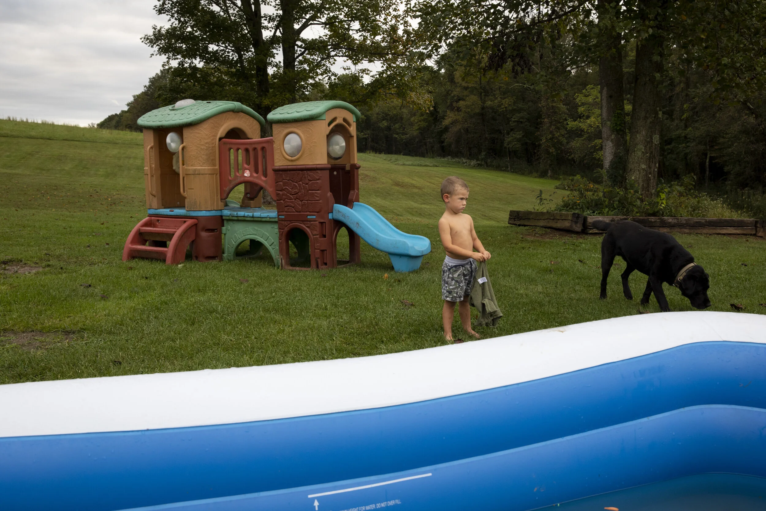  Silas Shaulis pouts after Danita McLaughlin told him he needed to put his shirt back on and that it was too cold for him to go swimming in their inflatable pool on Sept. 22, 2021. 