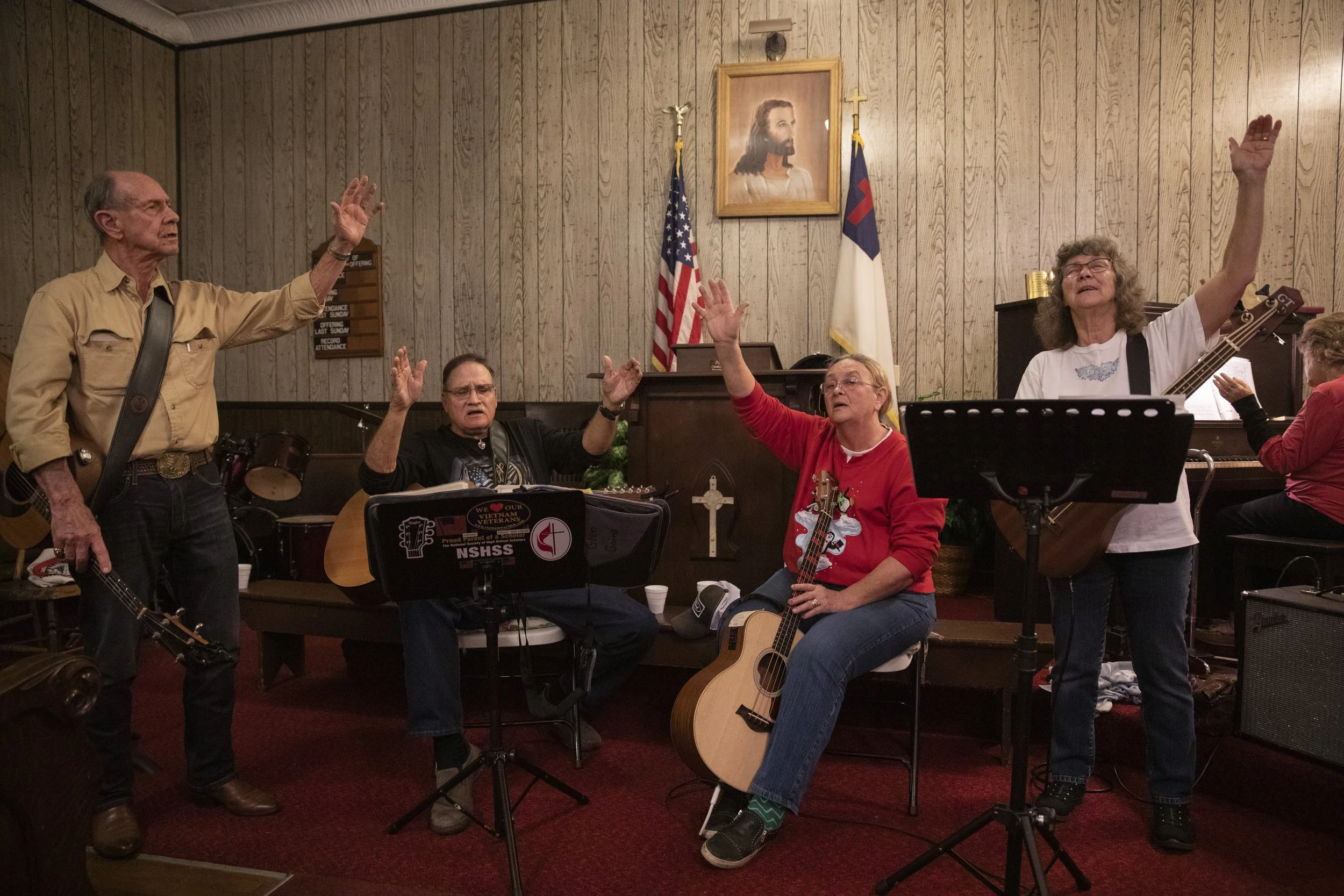  Larry Kent, Glen Goins, Ann Goins, Joyce Brown, and Judy Churchheus sing the final verses of “Amazing Grace” during a gospel music jam session at Graham Chapel Church outside Shade, Ohio. 