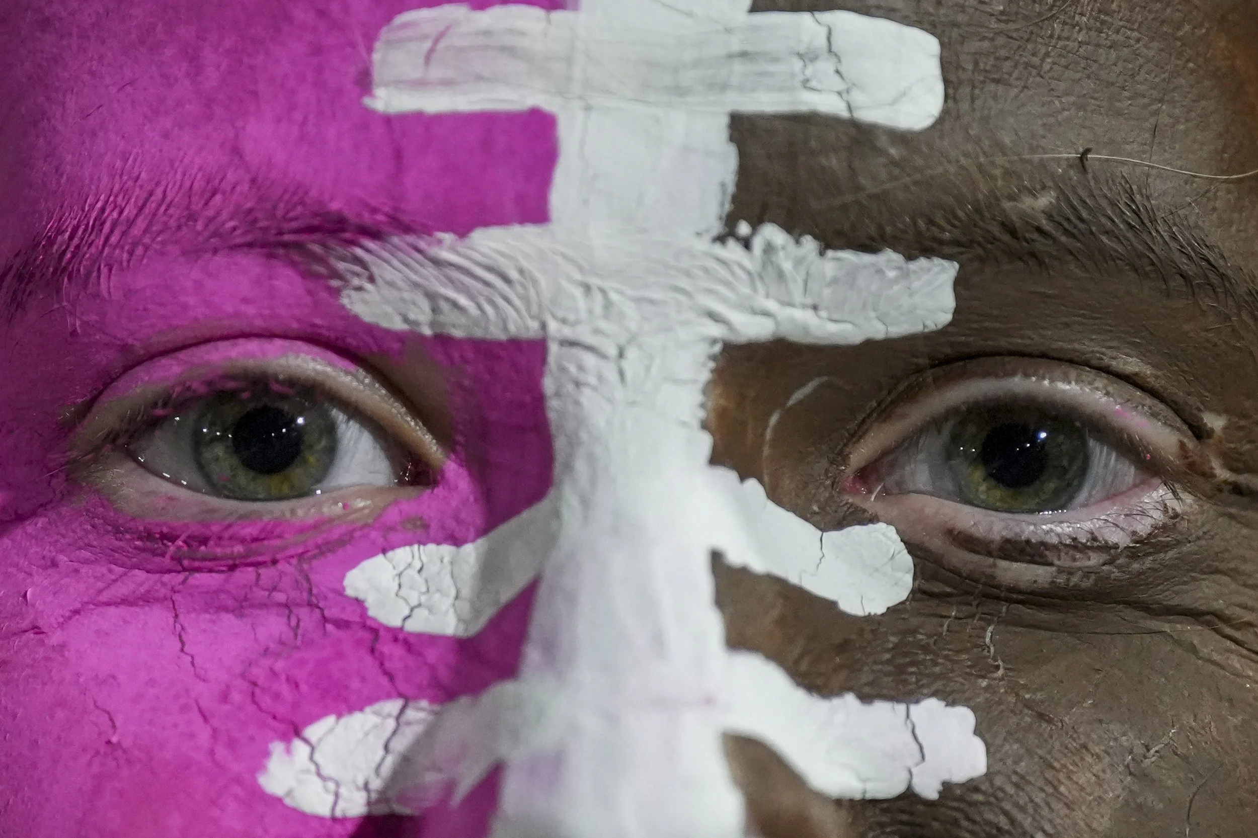 Munford sophomore Sydney Trimm poses for a portrait with her face painted like a football during the game between Lausanne Collegiate School and Munford High School in Munford, Tenn., on Friday, October 18, 2024.  