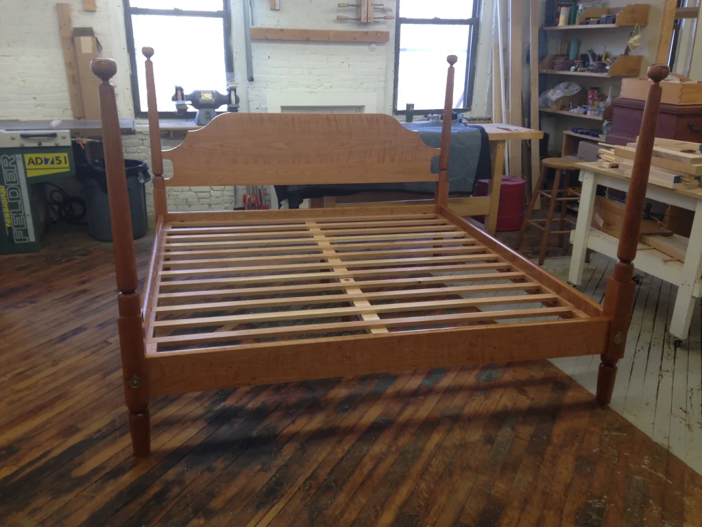 Traditional bed in figured cherry