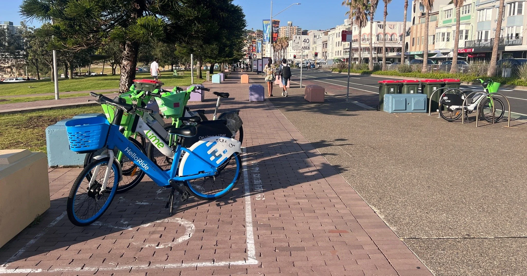 What do you notice in this photo?

Most of these share bikes are parked neatly in designated parking, with a wide, clear footpath for people walking.

We spend a lot of time out on streets and paths, talking with people and noticing how public spaces