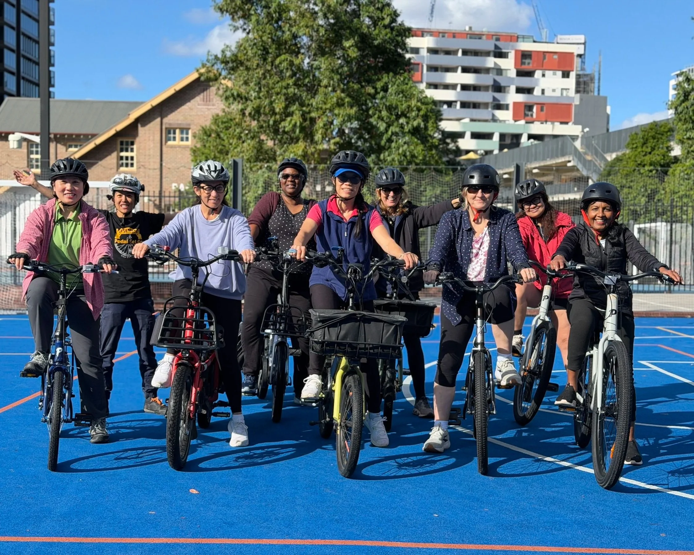 Women In Focus Confident City Rider participants on bikes after 6 weeks bike education program in Parramatta with Pedal Set Go