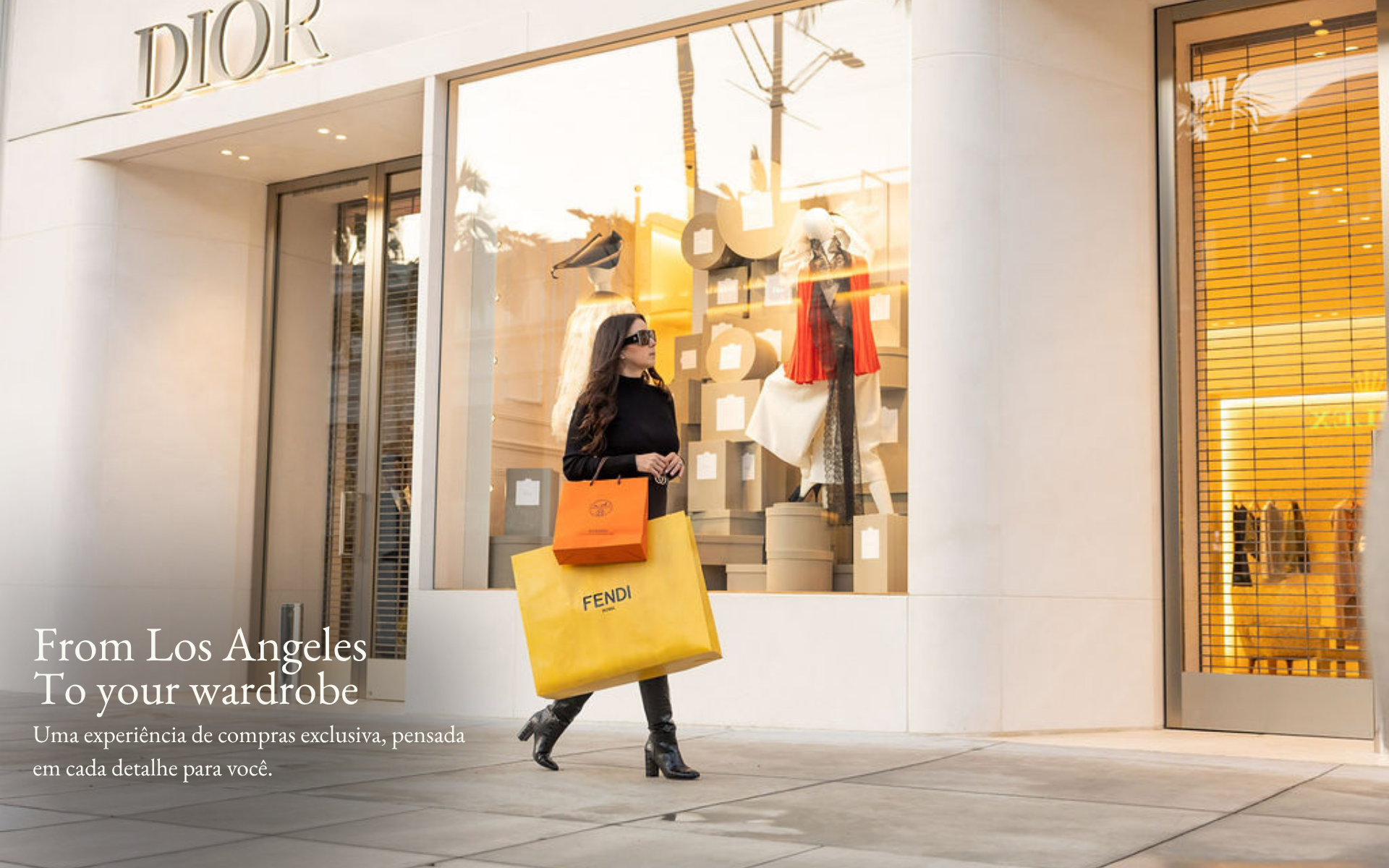 Personal Shopper with Designer shop bags in front of Dior, luxury