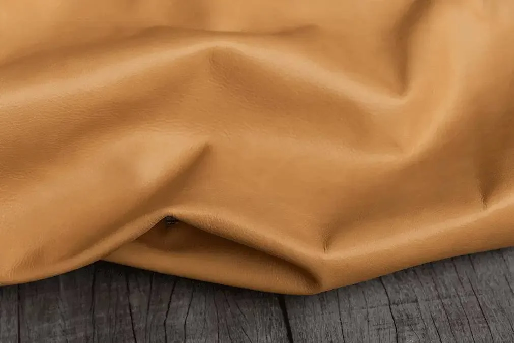 Arazzo Capri Upholstery Leather in Beige, Folded to Show Texture