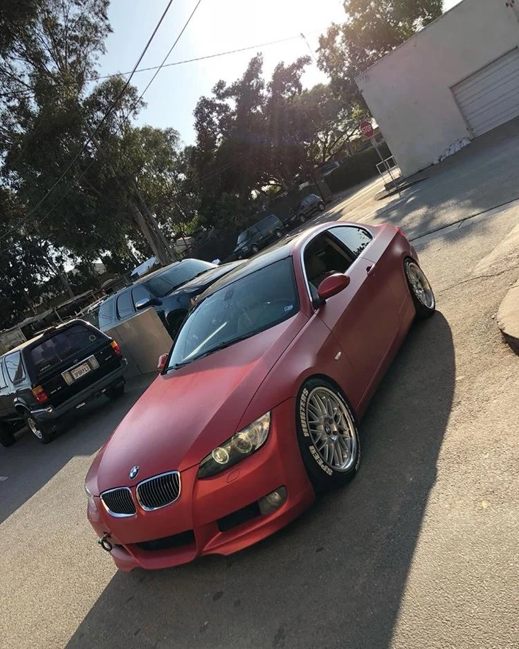  BMW 328i wrapped in 3M satin smoldering red. 