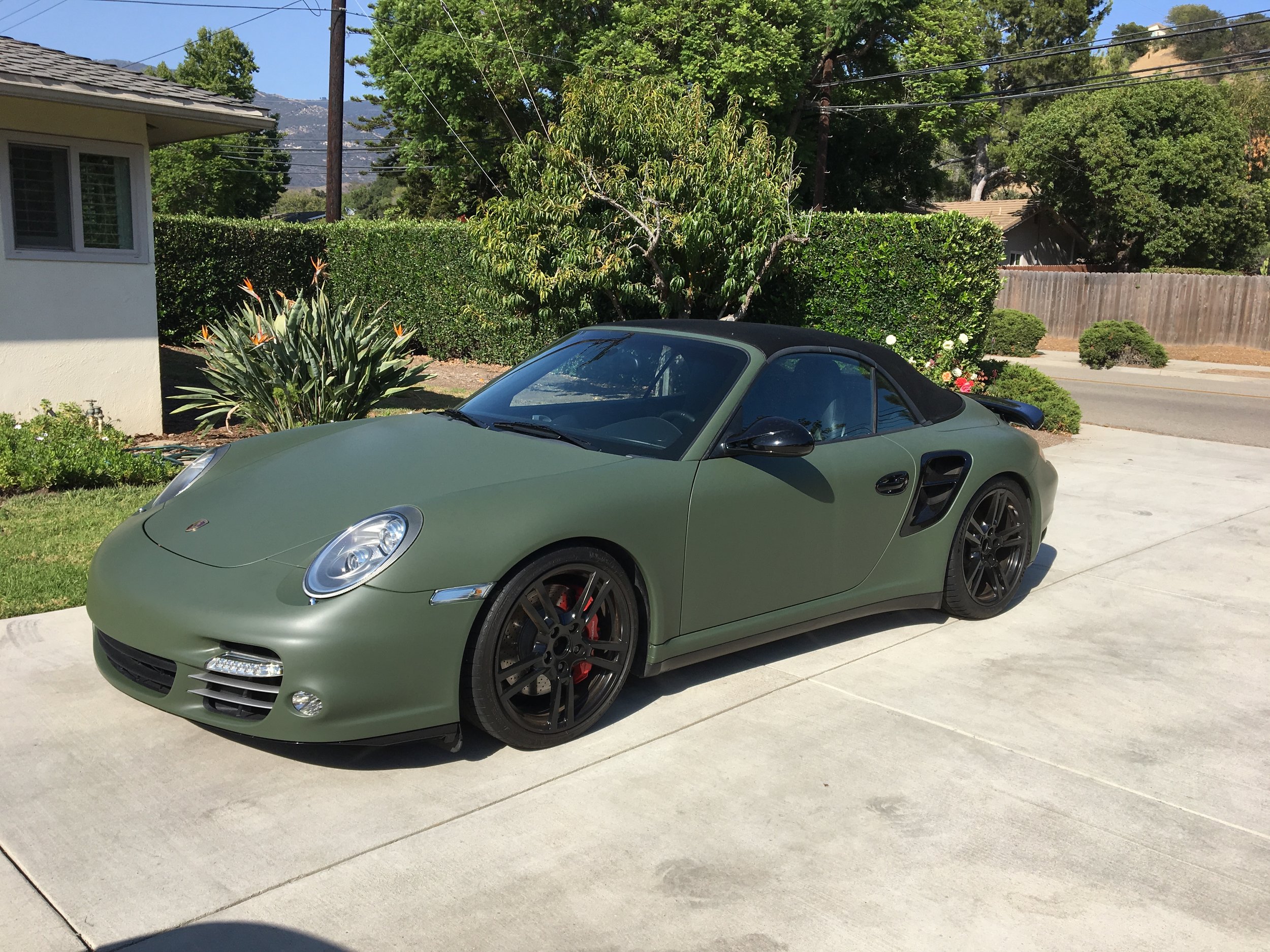  Porsche 911 Turbo in for full wrap in 3M matte military green. 