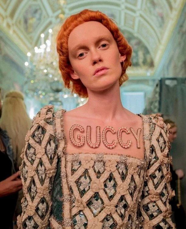 A NEW VERSE | Inspired by the renaissance, the Gucci Cruise 2018 collection featured embellished off-the-shoulder gowns, pearl balaclavas, retro florals and elaborate jewellery. &quot;Guccy&quot; was intentionally spelt this way as a nod to its medie