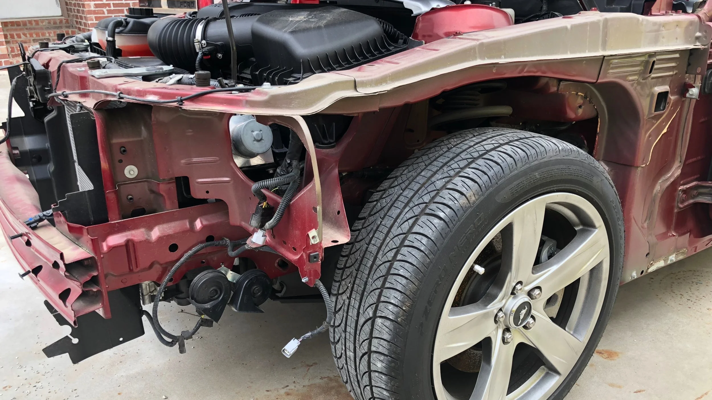 The exterior is stripped from the donor Mustang, and the conversion is now underway.