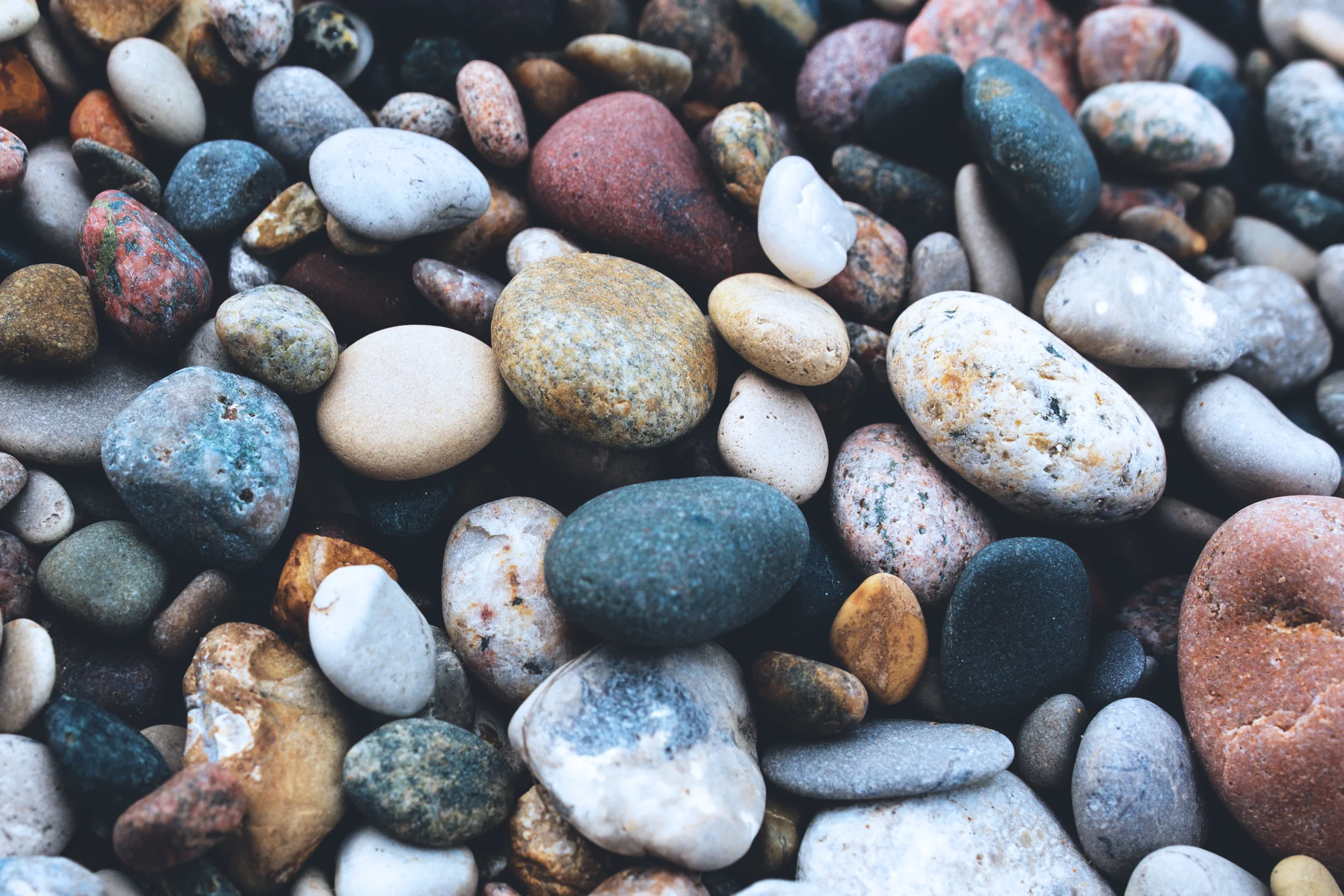 I offer creative approaches such as inviting the client to select pebbles to represent people in their lives, feelings they are struggling with, or different options in a difficult decision, for example, to achieve a depth of understanding. Most clients find this strange at first, but are surprised at how much insight it creates.