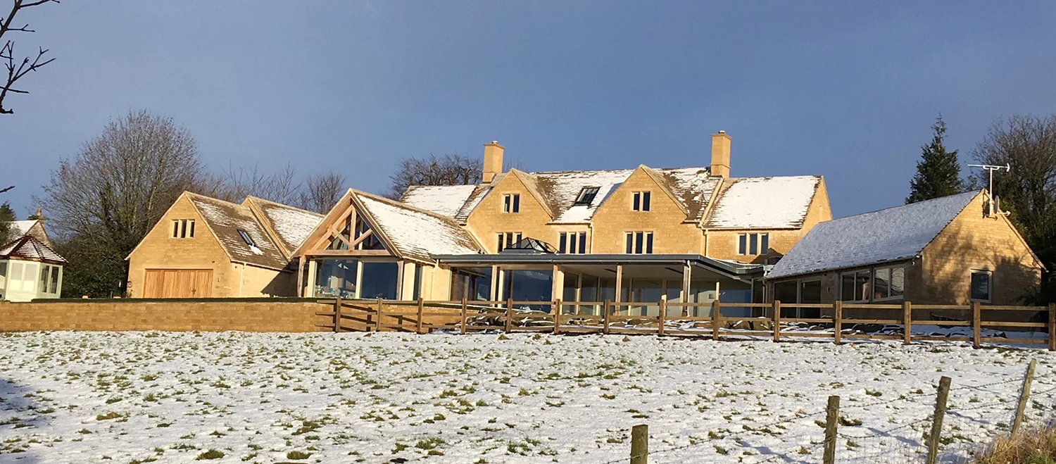 2b-rear-elevation-in-snow-from-the-valley-(1).jpg