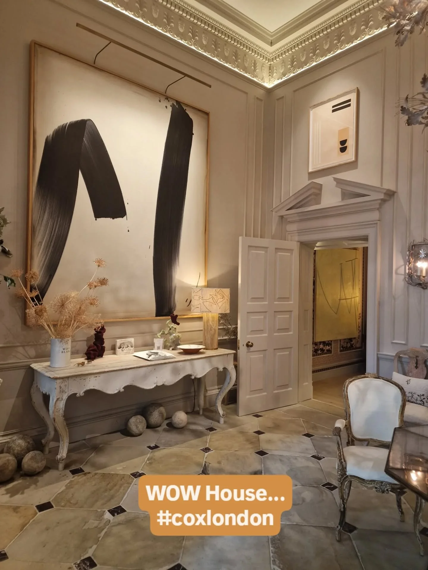 Impressive historical entrance hall room set @designcentrech where @coxlondon and @maisonartefact have created an architectural delight full of artisanal details such as the incredible bronze oak leaf chandelier, floor mosaic, beautiful artworks, fau