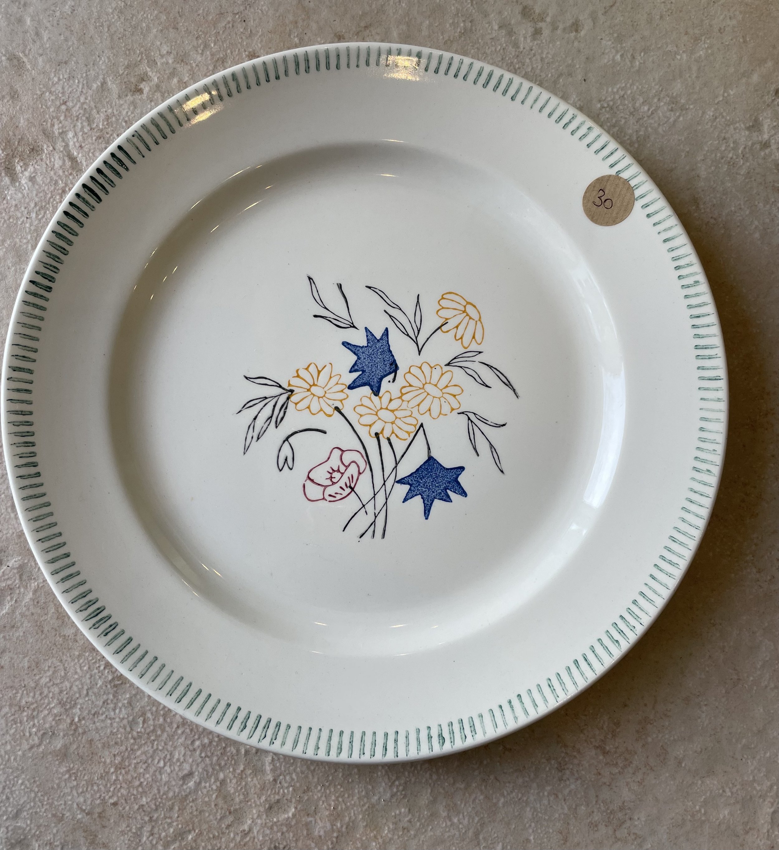 Plat rond porcelaine blanche à fleurs et tirets verts