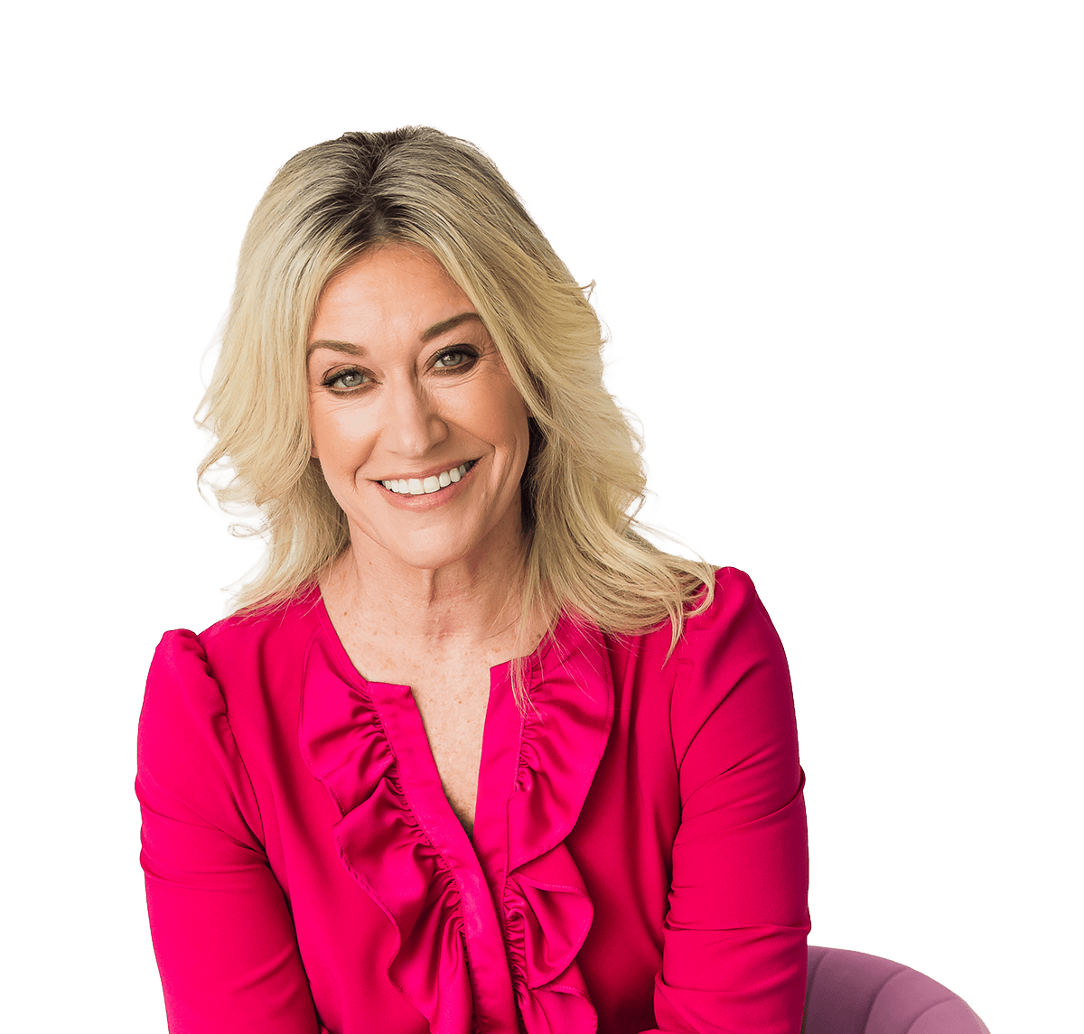 Anna Marcolin, Illinois based therapist and virtual life coach, smiling, wearing a bright pink, ruffled shirt