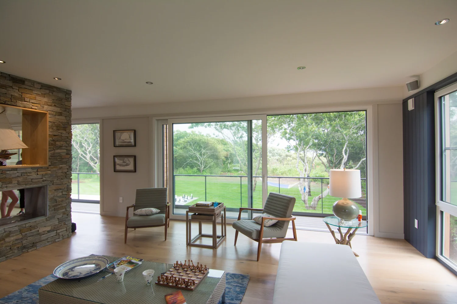 Living room with large sliding doors and fireplace