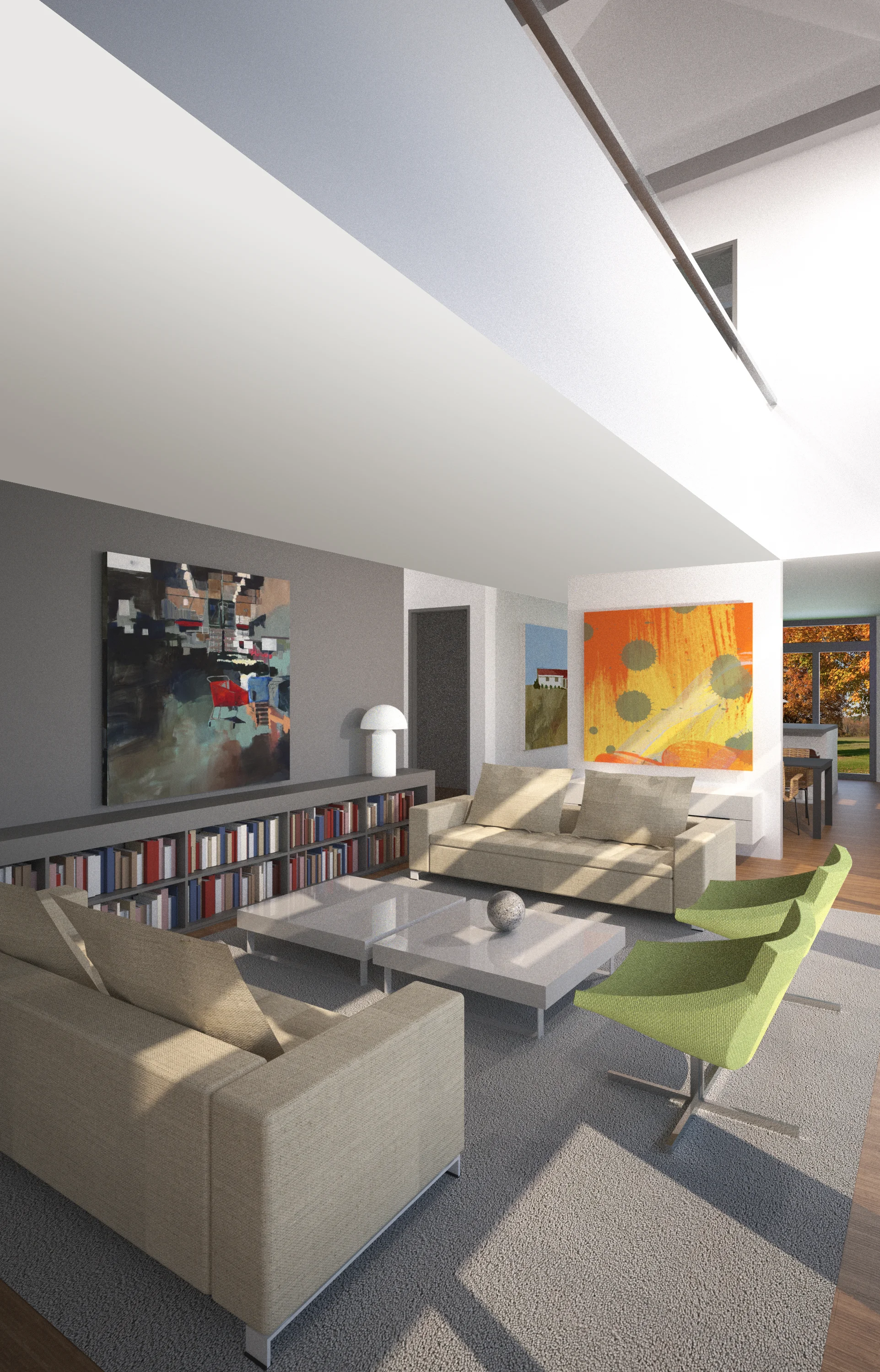Large living room with colorful art and low bookshelves.