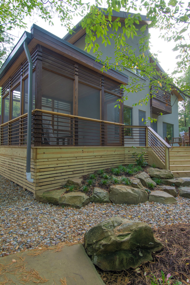 Screened in porch and rock garden