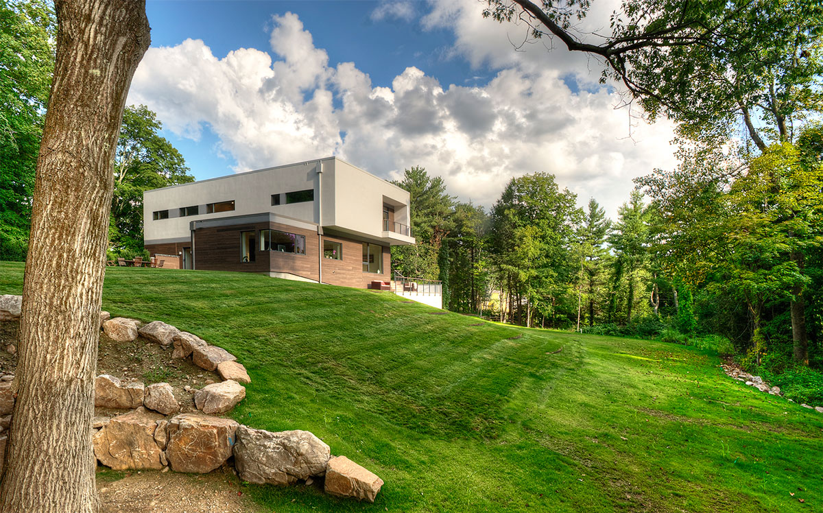 Sloping lawn up to home