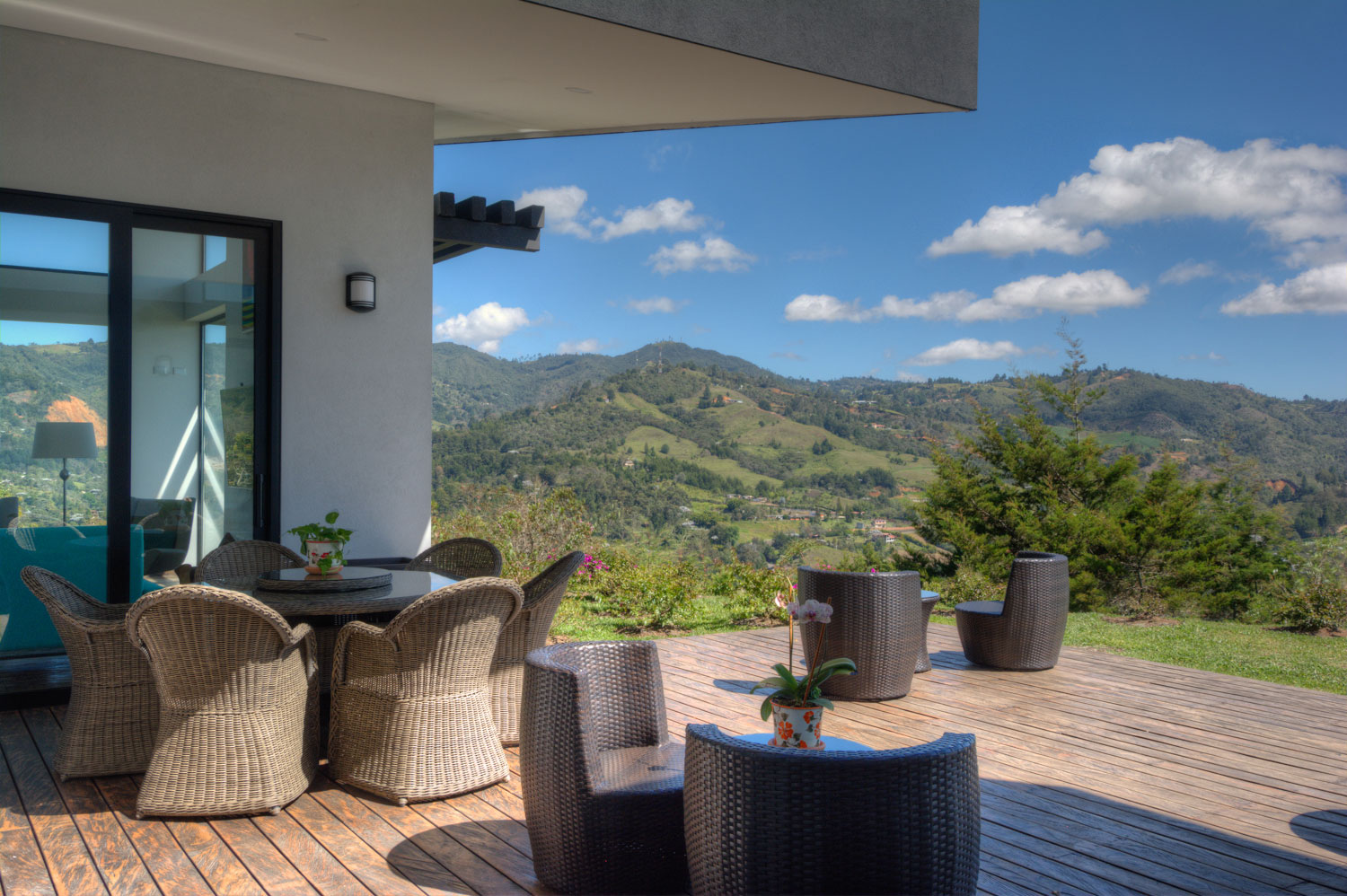 Deck and cantilevered roofline with mountains