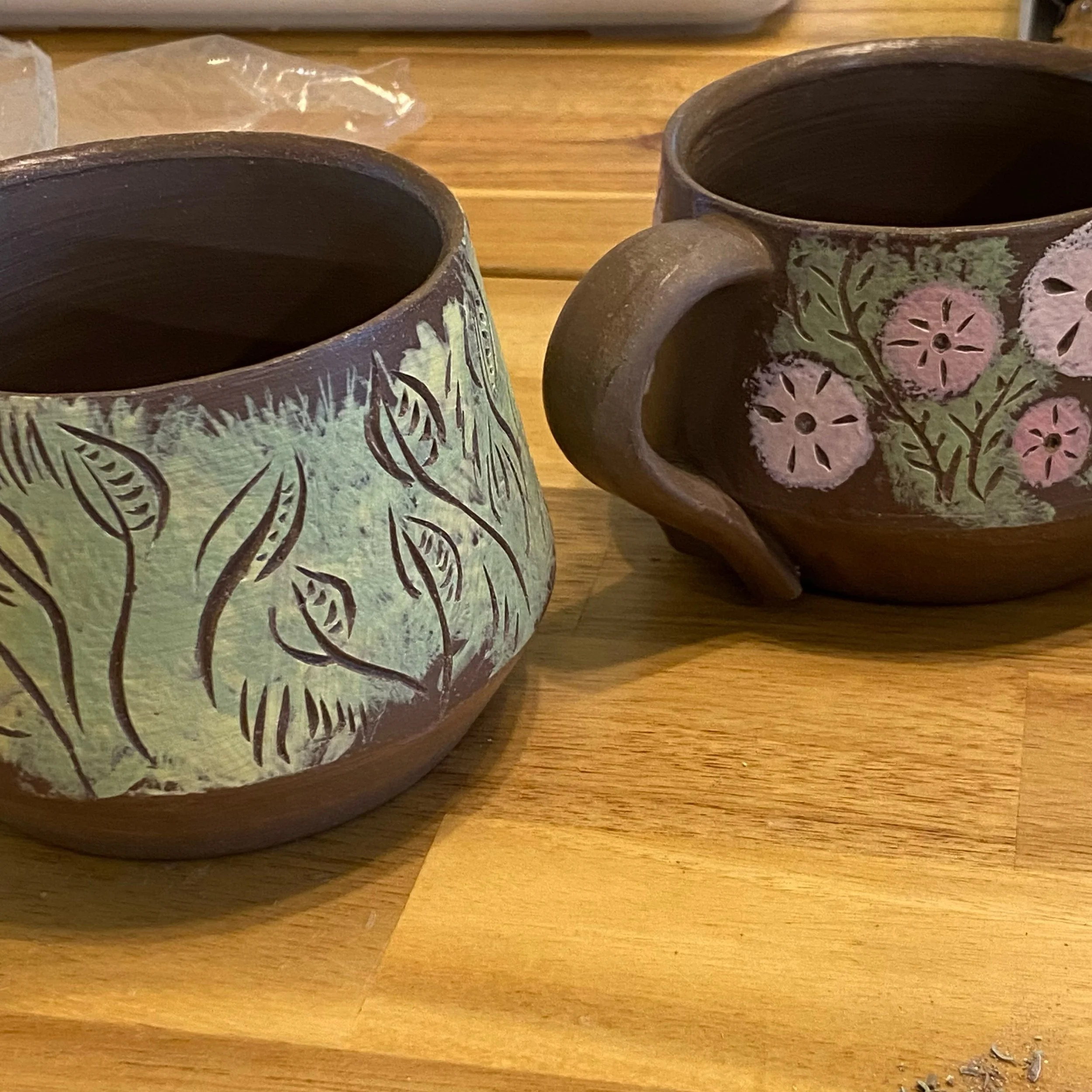 It&rsquo;s been surface design days around here lately! Still working on silkscreen transfers, but it was time for something a little different &mdash; I&rsquo;m enjoying carving into underglaze for these few mugs.