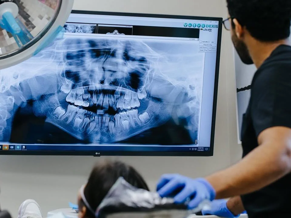 A 3D imaging scan in New York City shows detailed views of teeth and jaw.