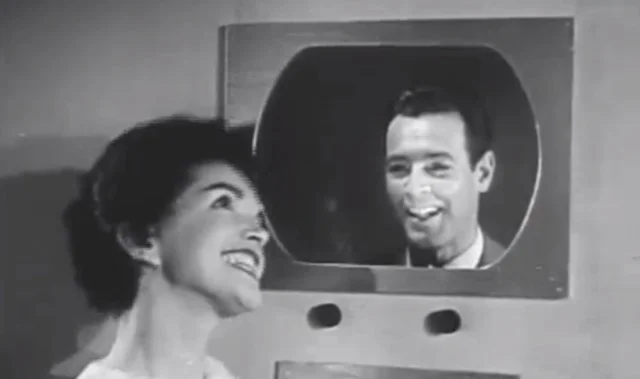 Woman talking on a videophone in the 1955 short film The Future is Now 