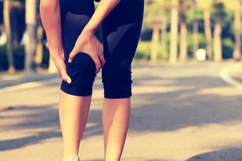 woman runner hold her sports injured leg woman runner hold her sports injured leg woman runner hold her sports injured leg woman runner hold her sports injured leg