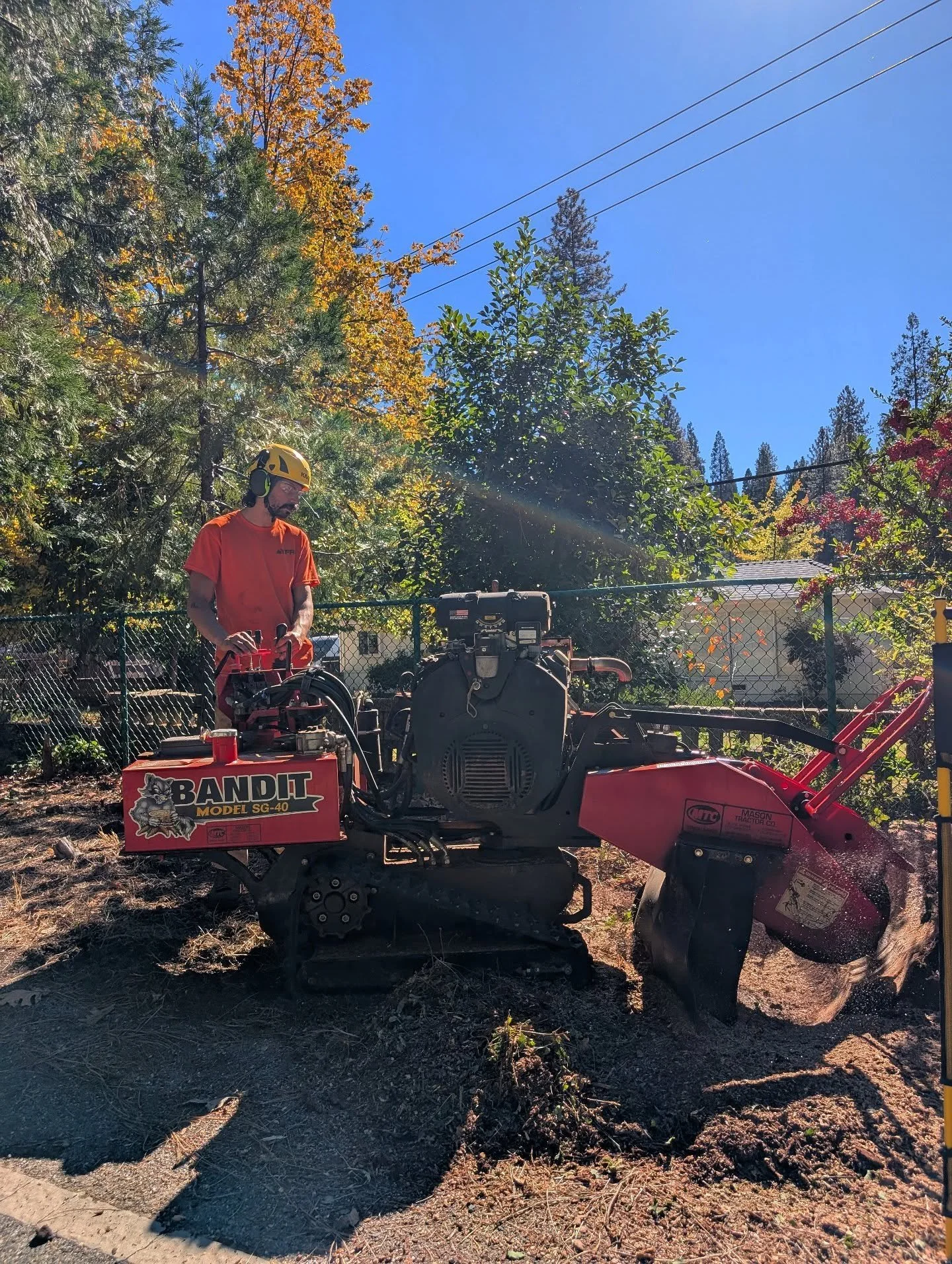 Got an old unsightly stump you'd love to see gone? We can help with that! 
Here Lucas is expertly grinding away an oak stump left by the utility clearance crews.  Well, maybe not expertly, this was actually the first stump he had ever ground. But he