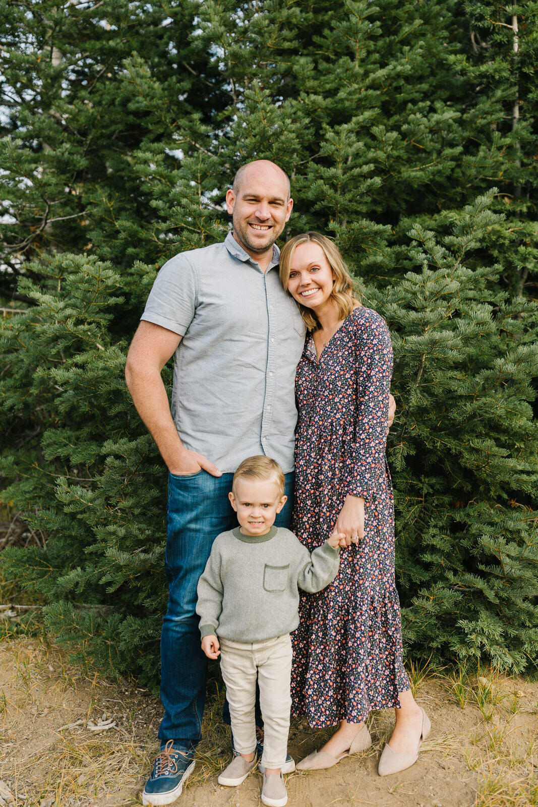 Deschutes National Forest- Family of three poses- photographers in Bend