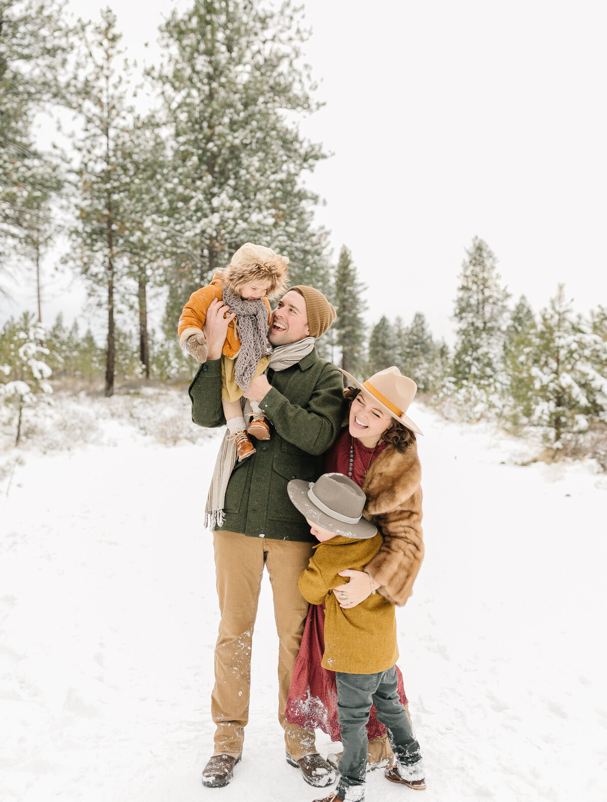 Deschutes National Forest- Family of four poses- photographers in Bend